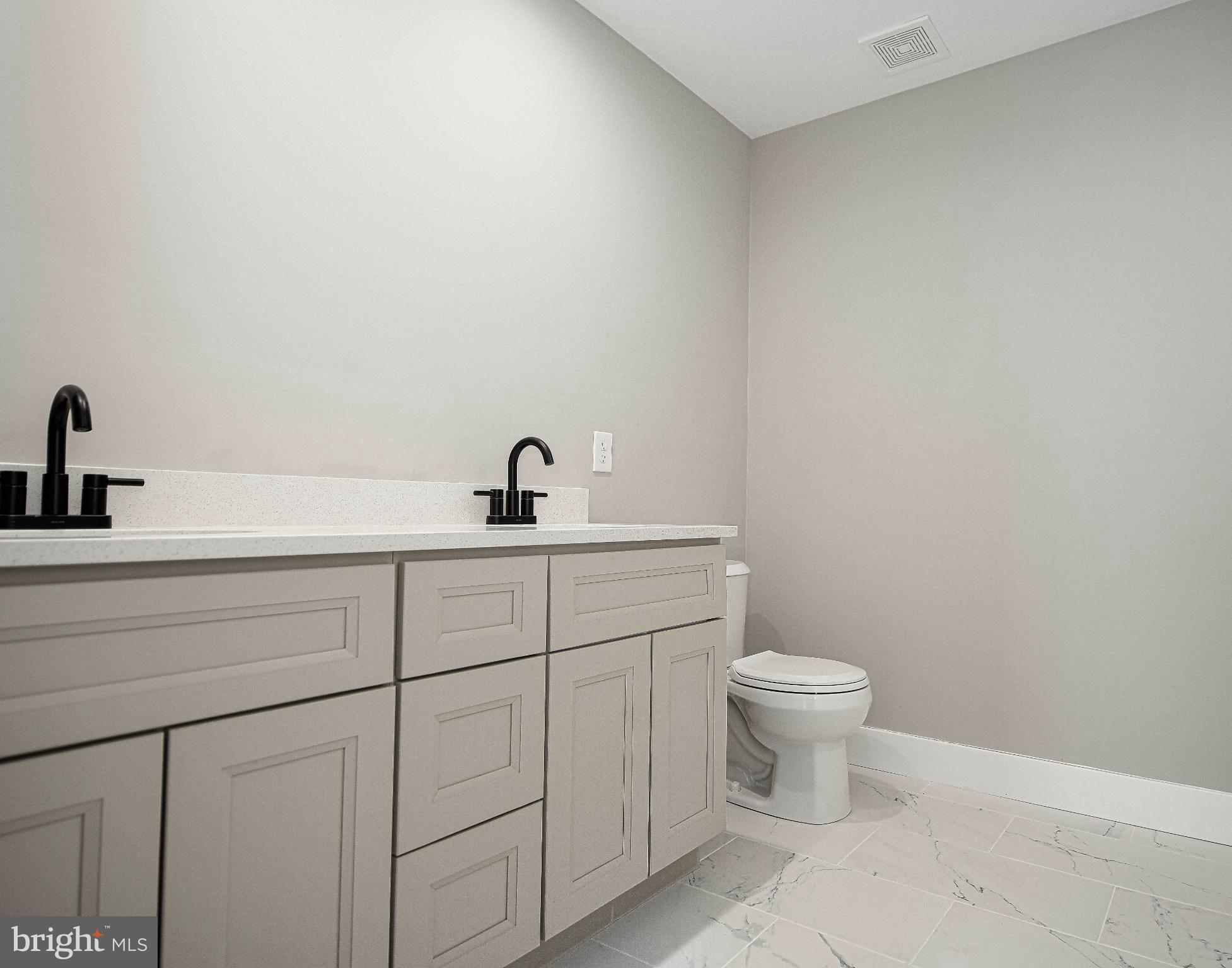 831 Deer Ridge Drive Westminster, MD 21158 - Photo 41 of 61 Sleek modern bathroom with elegant finishes.