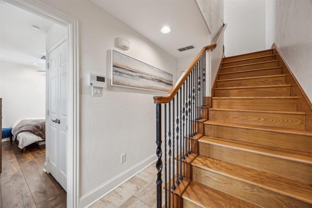 1012 Pavillion Street Dallas, TX 75204 - Photo 22 of 30 Inviting entryway with natural wood stairs.