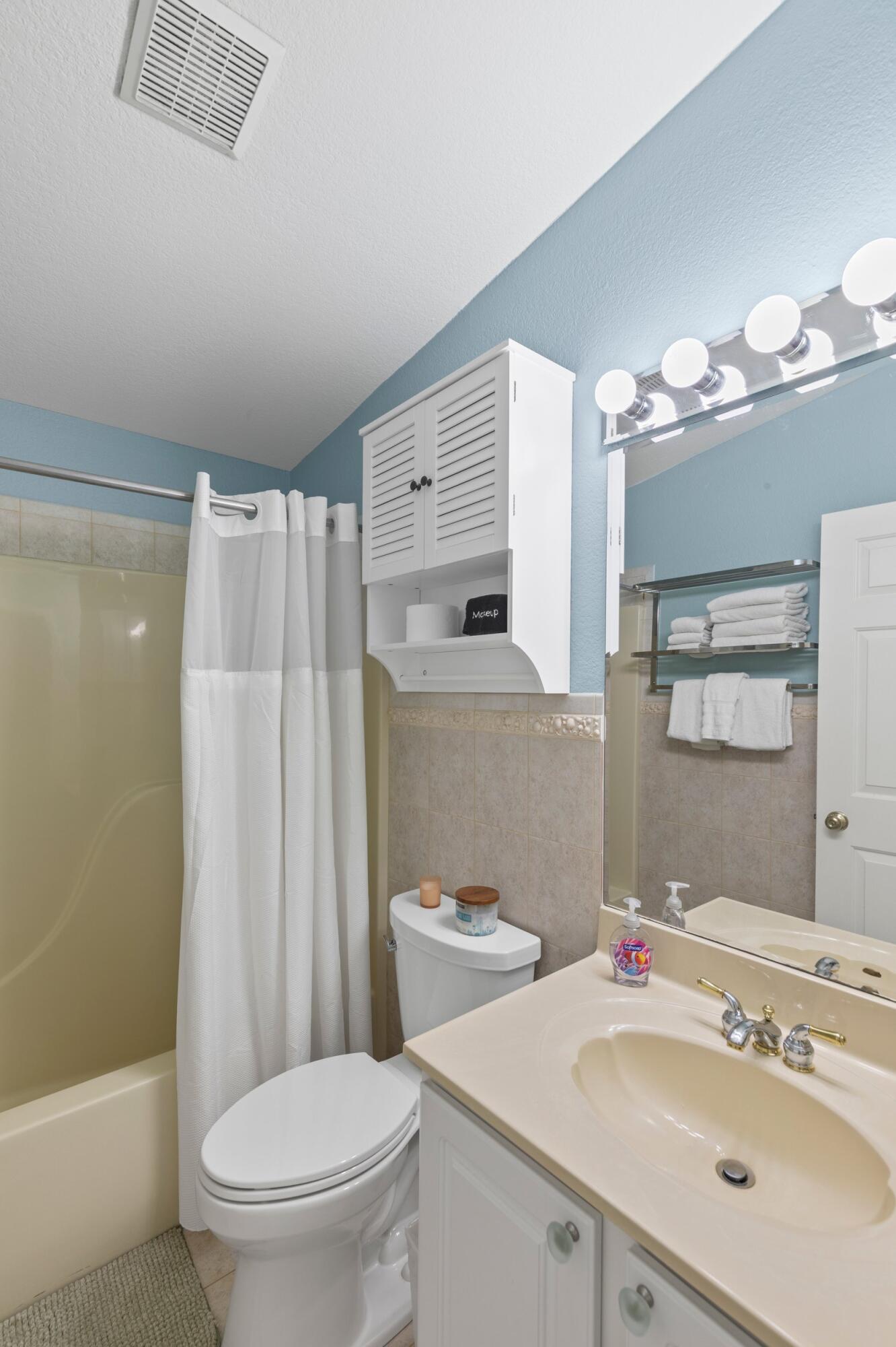157 Mars Lane Key West, FL 33040 - Photo 27 of 41 a bathroom with a sink a toilet and shower
