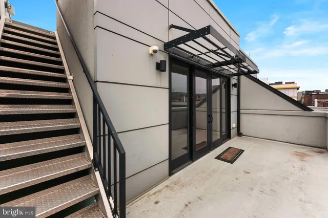 a terrace with a city view