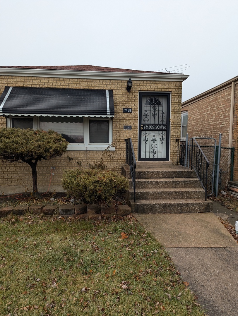 7458 West 64th Place Summit, IL 60501 - Photo 1 of 1 a front view of a house