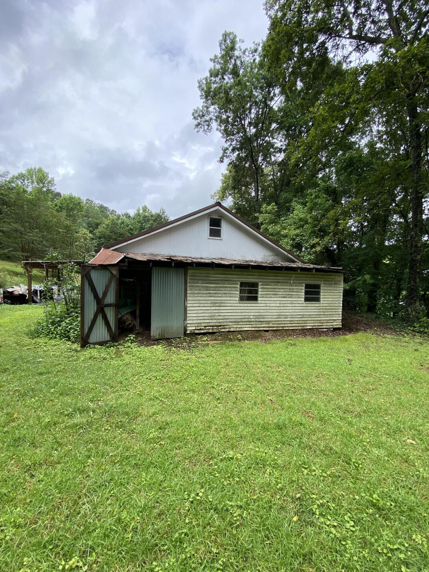361 Marble Top Road Chickamauga, GA 30707 - Photo 22 of 22 Rear Garage Storage