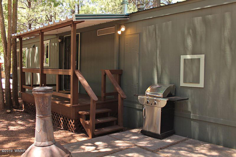 5472 North Blue Ridge Loop Pinetop, AZ 85935 - Photo 20 of 22 a view of entryway and hall with wooden floor