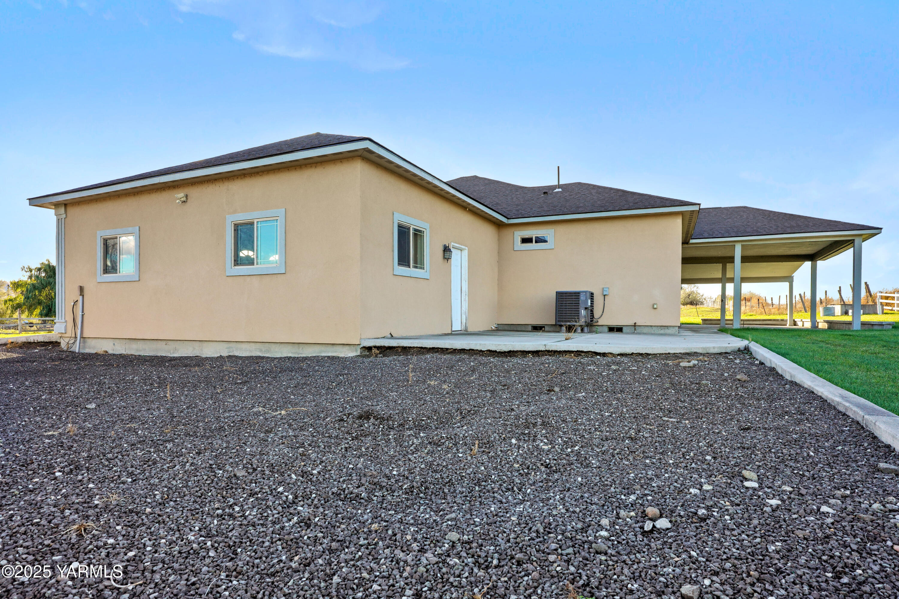 10002 North Wamba Road Prosser, WA 99350 - Photo 36 of 40 a view of house with backyard