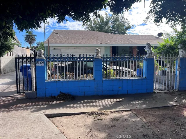a house with trees in front of it