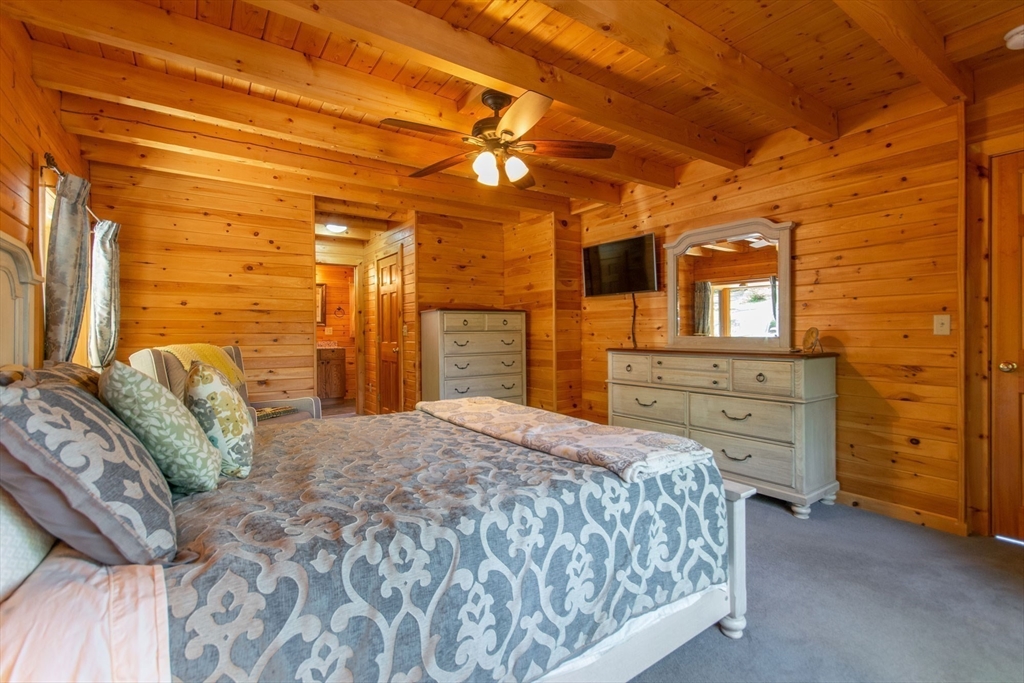 44 3rd Street Brimfield, MA 01010 - Photo 23 of 42 a spacious bedroom with a bed and furniture