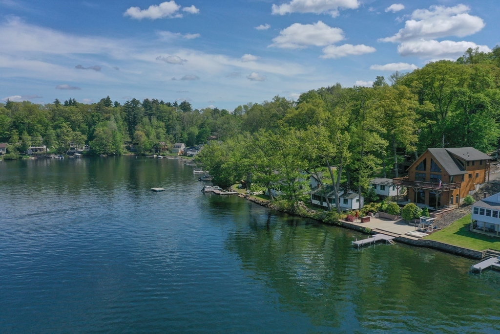 44 3rd Street Brimfield, MA 01010 - Photo 40 of 42 a view of a lake with houses in the back