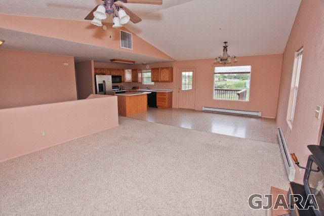 579 29 Road Grand Junction, CO 81501 - Photo 21 of 40 an empty room with windows and ceiling fan