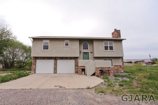 579 29 Road Grand Junction, CO 81501 - Photo 5 of 40 a house view with a outdoor space