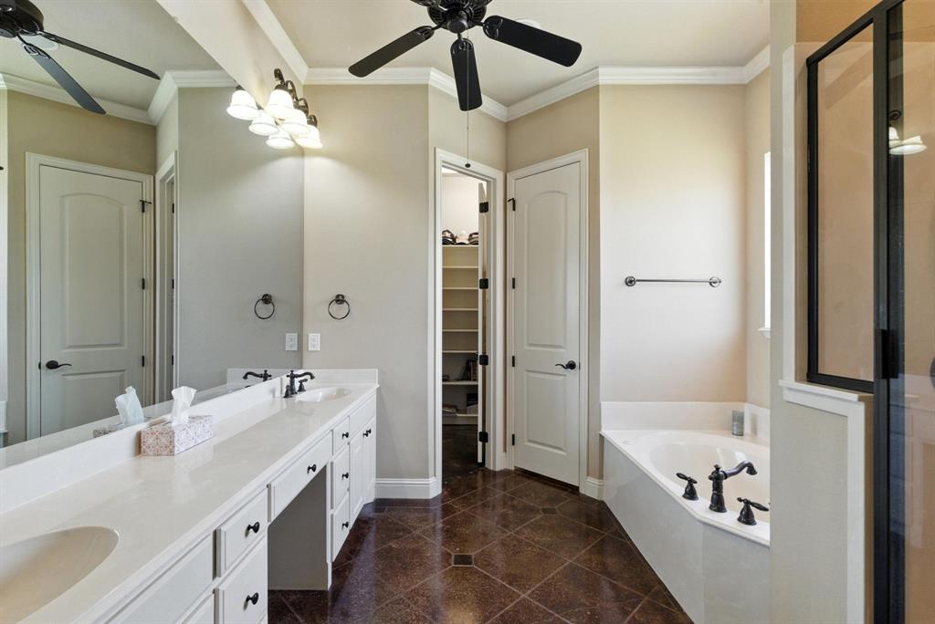 680 Sunfish Point Bluff Dale, TX 76433 - Photo 18 of 40 a spacious bathroom with a tub sink double vanity and shower