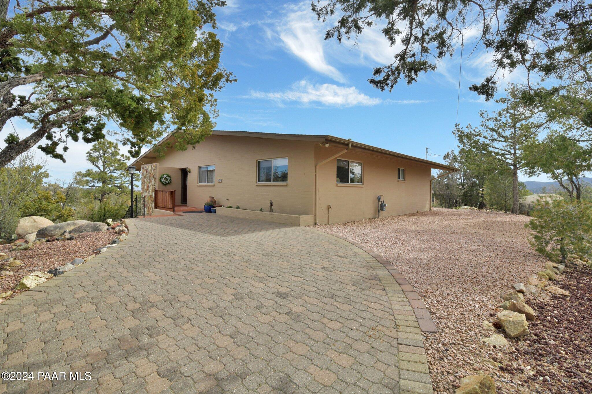 2033 Forest Hills Road Prescott, AZ 86303 - Photo 2 of 44 Front and side of home w RV Parking