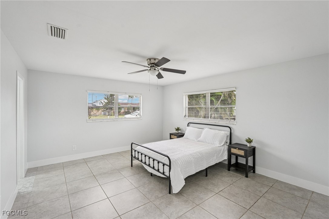 2342 Aldridge Avenue Fort Myers, FL 33907 - Photo 13 of 21 a bedroom with a bed and a window