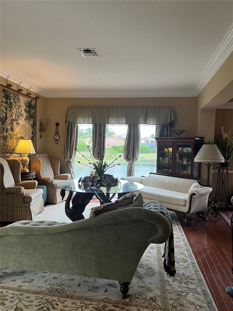 9130 Nugent Trail West Palm Beach, FL 33411 - Photo 11 of 20 a view of a living room and bedroom
