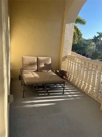 a view of a living room and bathroom