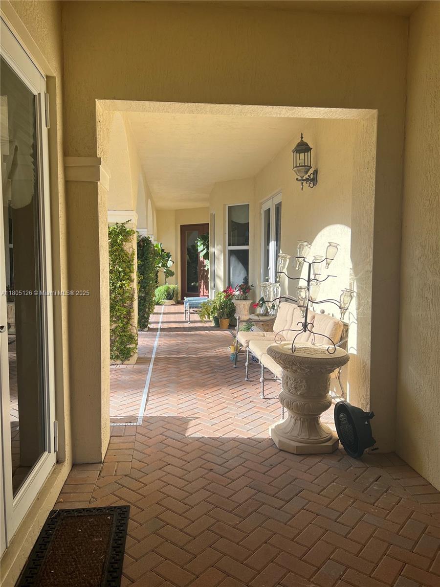 9130 Nugent Trail West Palm Beach, FL 33411 - Photo 13 of 20 a view of a living room and bathroom