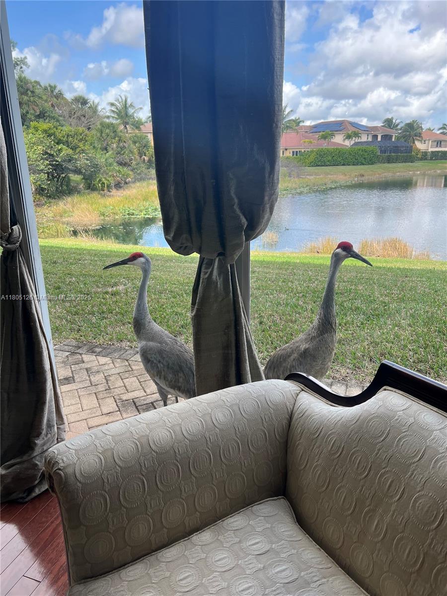 9130 Nugent Trail West Palm Beach, FL 33411 - Photo 20 of 20 a view of a couches in the roof deck