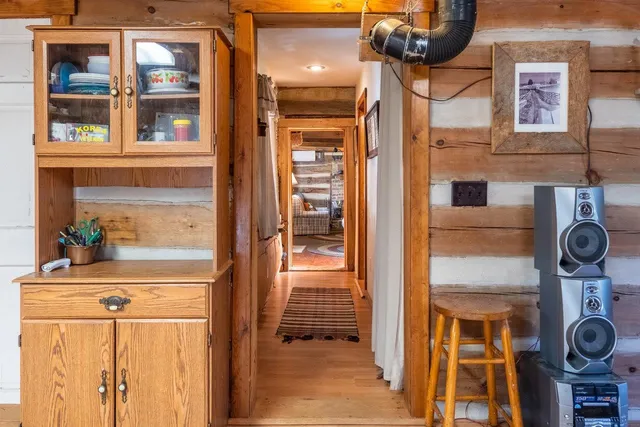 a room with furniture and a fireplace