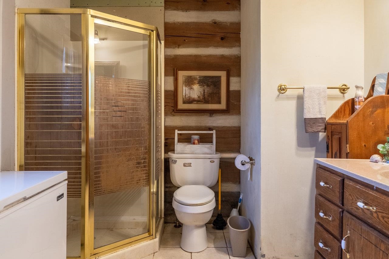 800 Cove Mountain Road Mathias, WV 26812 - Photo 25 of 74 a bathroom with a toilet and a shower
