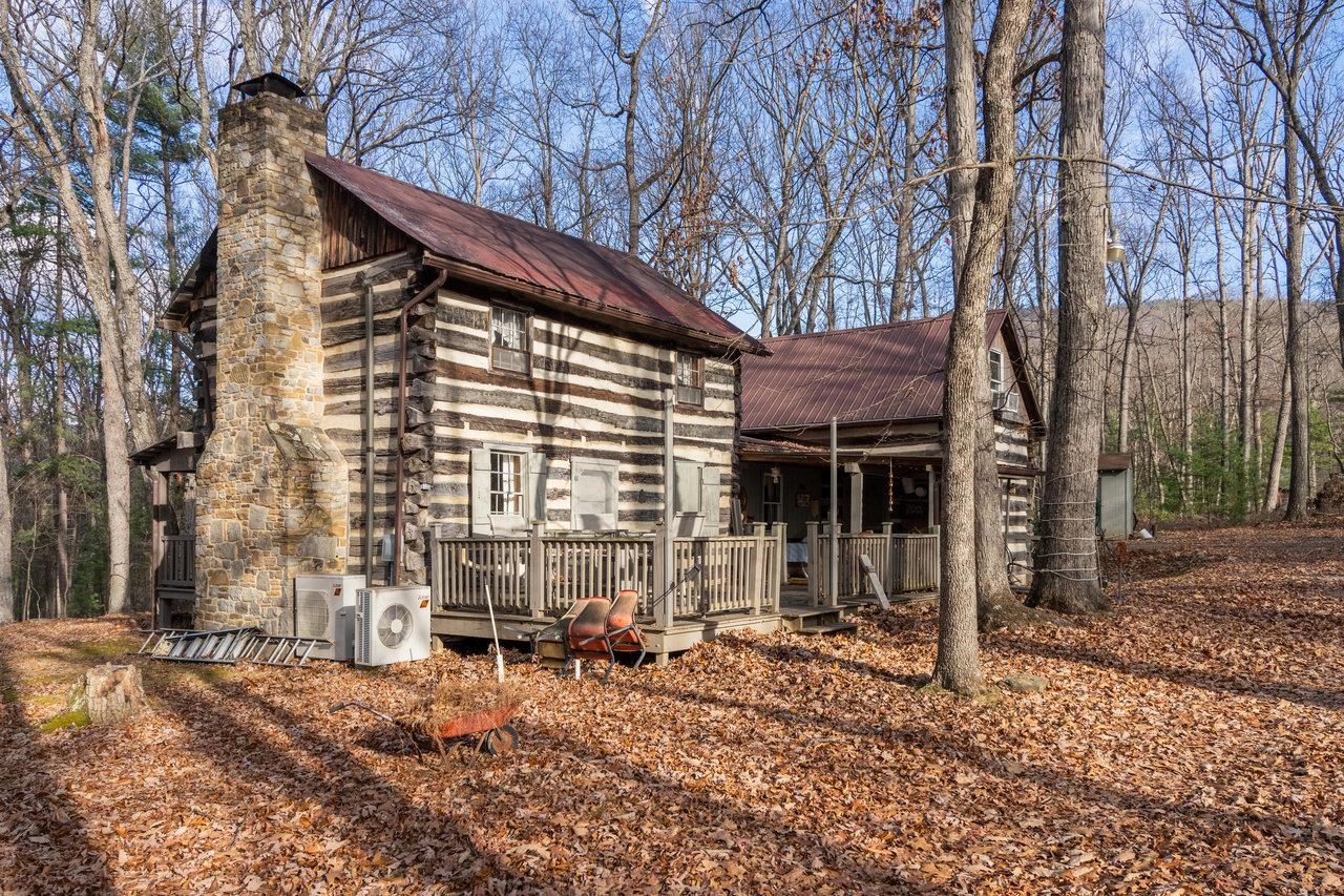800 Cove Mountain Road Mathias, WV 26812 - Photo 47 of 74 a backyard of a house with barbeque oven table and chairs
