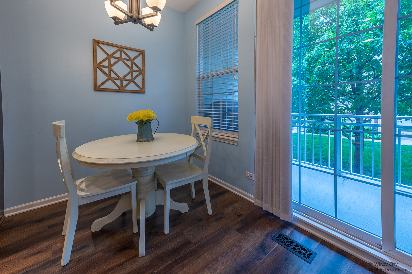 645 Pheasant Trail St. Charles, IL 60174 - Photo 5 of 18 a view of a dining room with furniture window and wooden floor