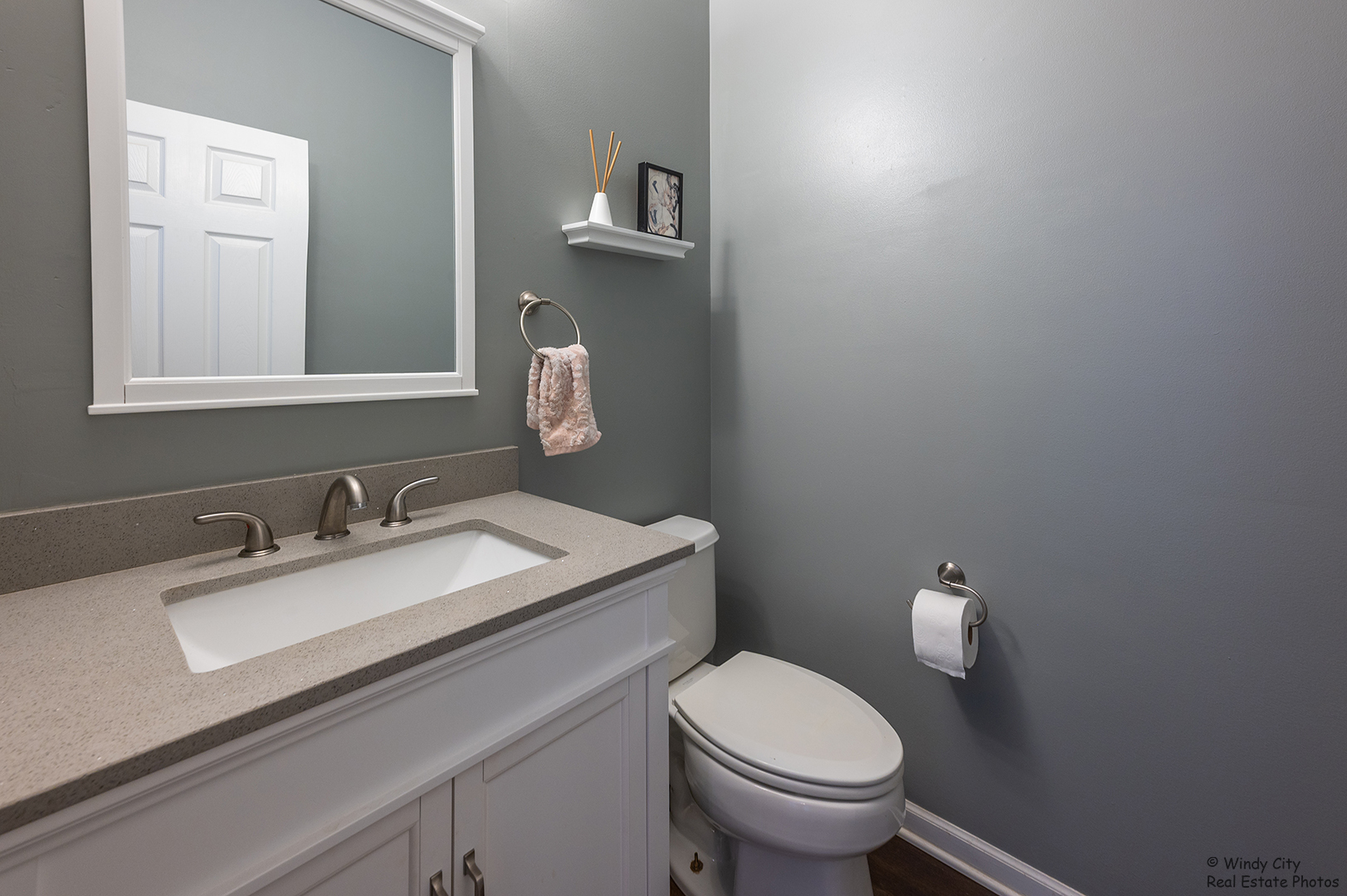 645 Pheasant Trail St. Charles, IL 60174 - Photo 10 of 18 a bathroom with a granite countertop toilet sink and mirror