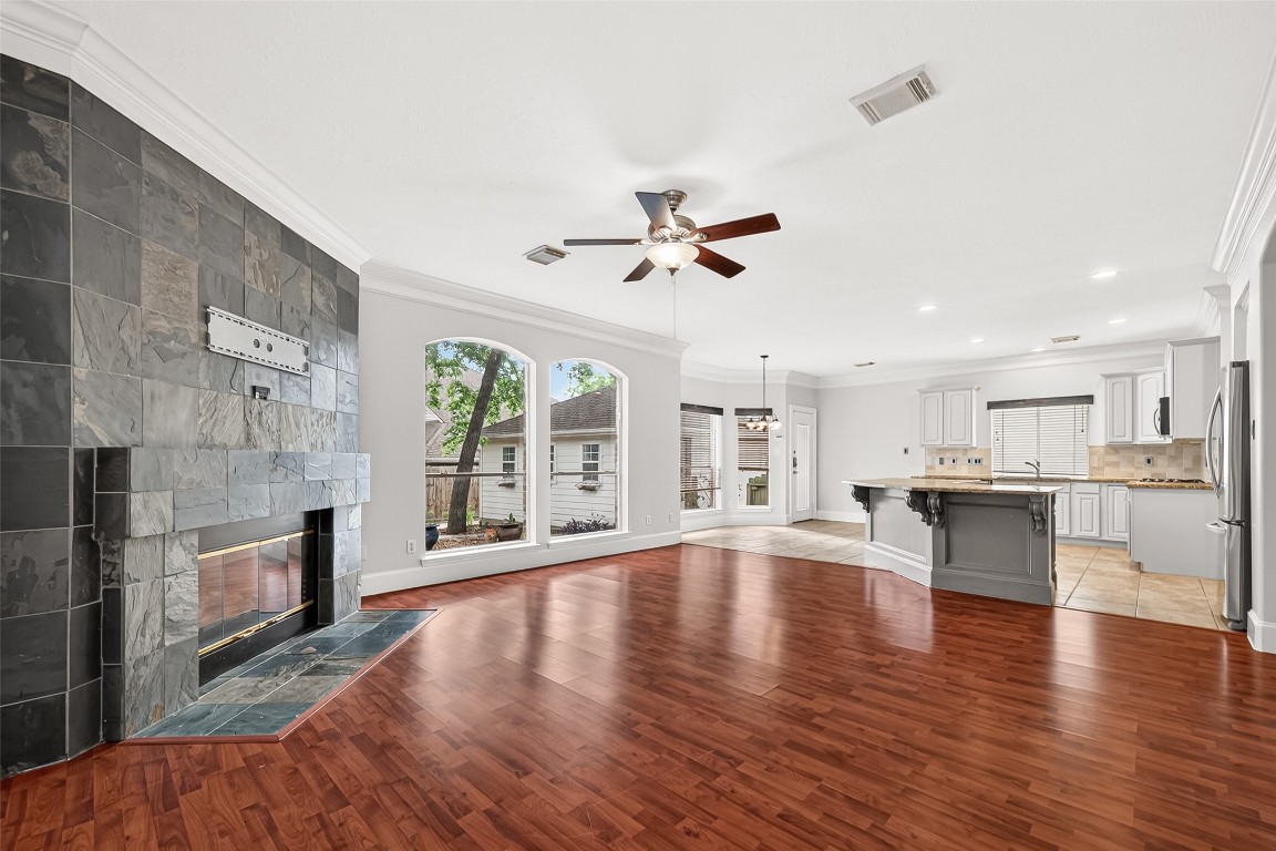 23206 Kobi Park Court Spring, TX 77373 - Photo 12 of 46 Spacious living area flows to breakfast and kitchen.
