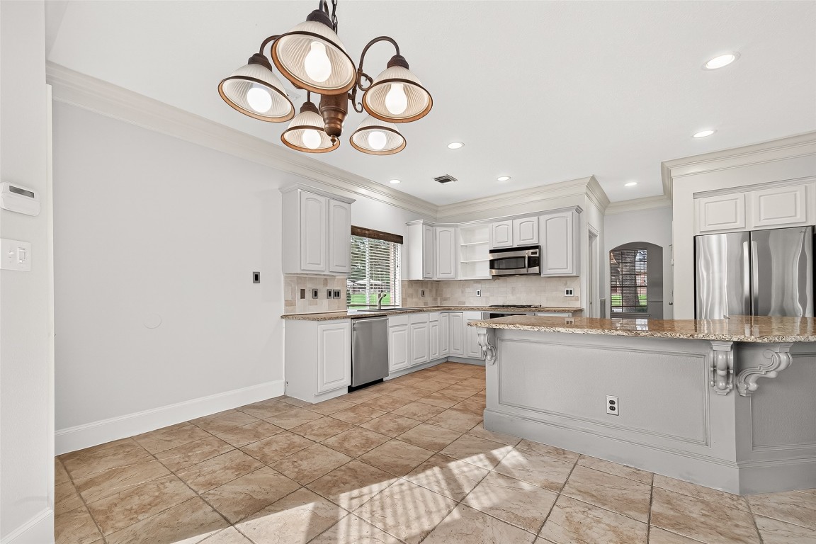23206 Kobi Park Court Spring, TX 77373 - Photo 18 of 46 Kitchen and breakfast.