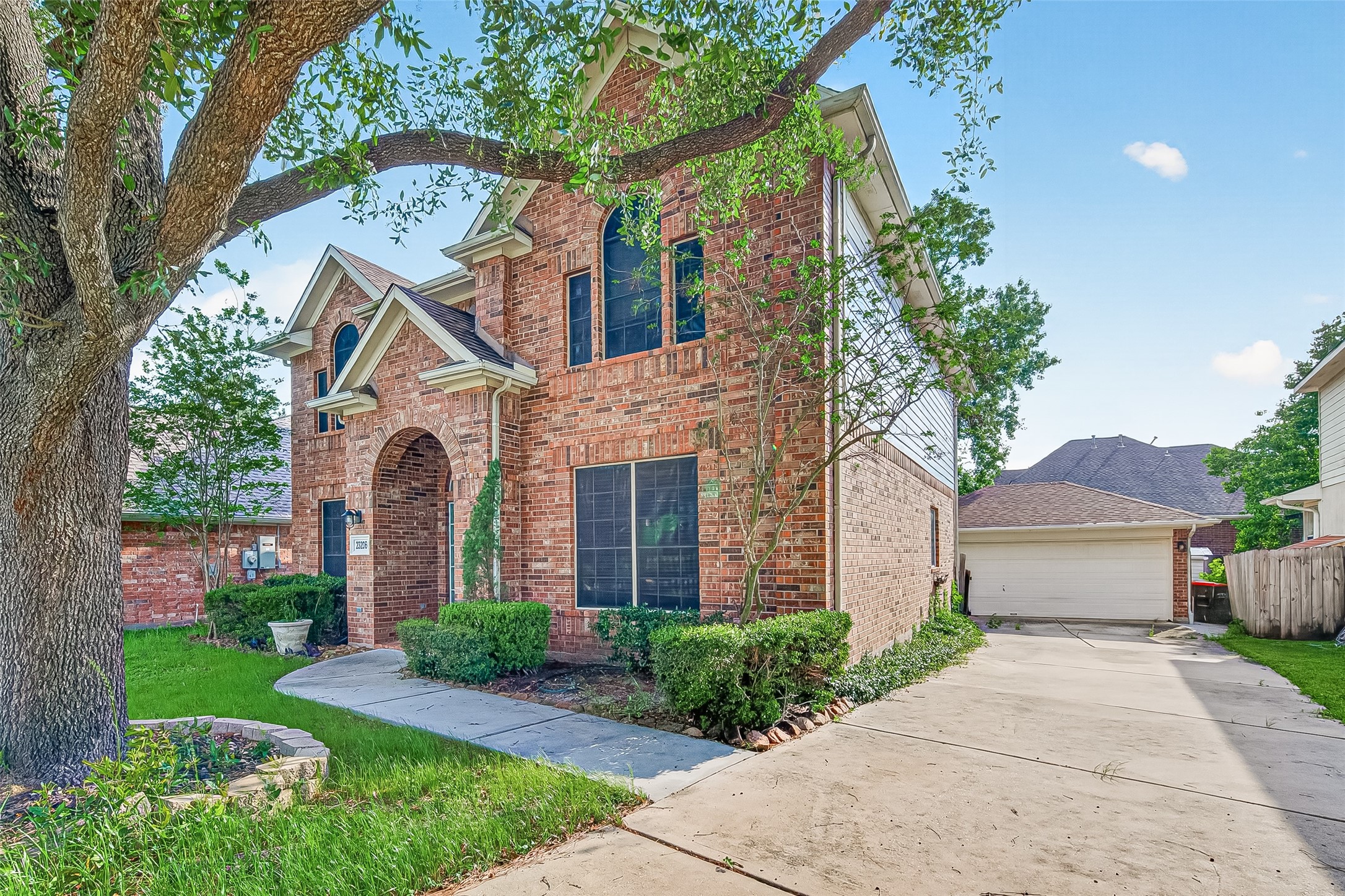 23206 Kobi Park Court Spring, TX 77373 - Photo 2 of 46 Driveway leads to detached garage.
