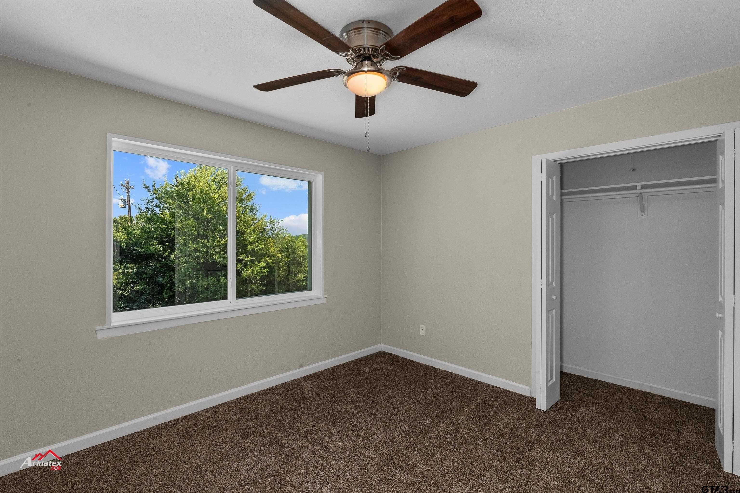6973 FM 449 Marshall, TX 75670 - Photo 12 of 29 an empty room with a window
