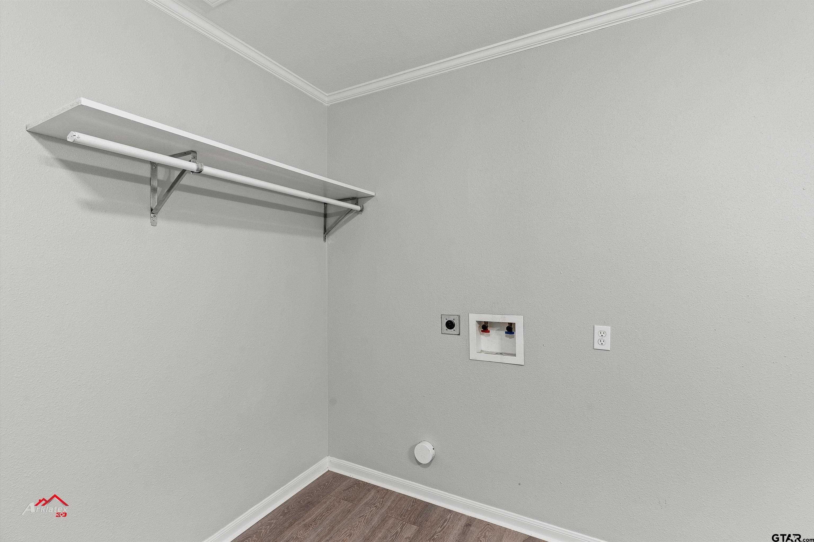 6973 FM 449 Marshall, TX 75670 - Photo 15 of 29 a view of a room with racks on the wall