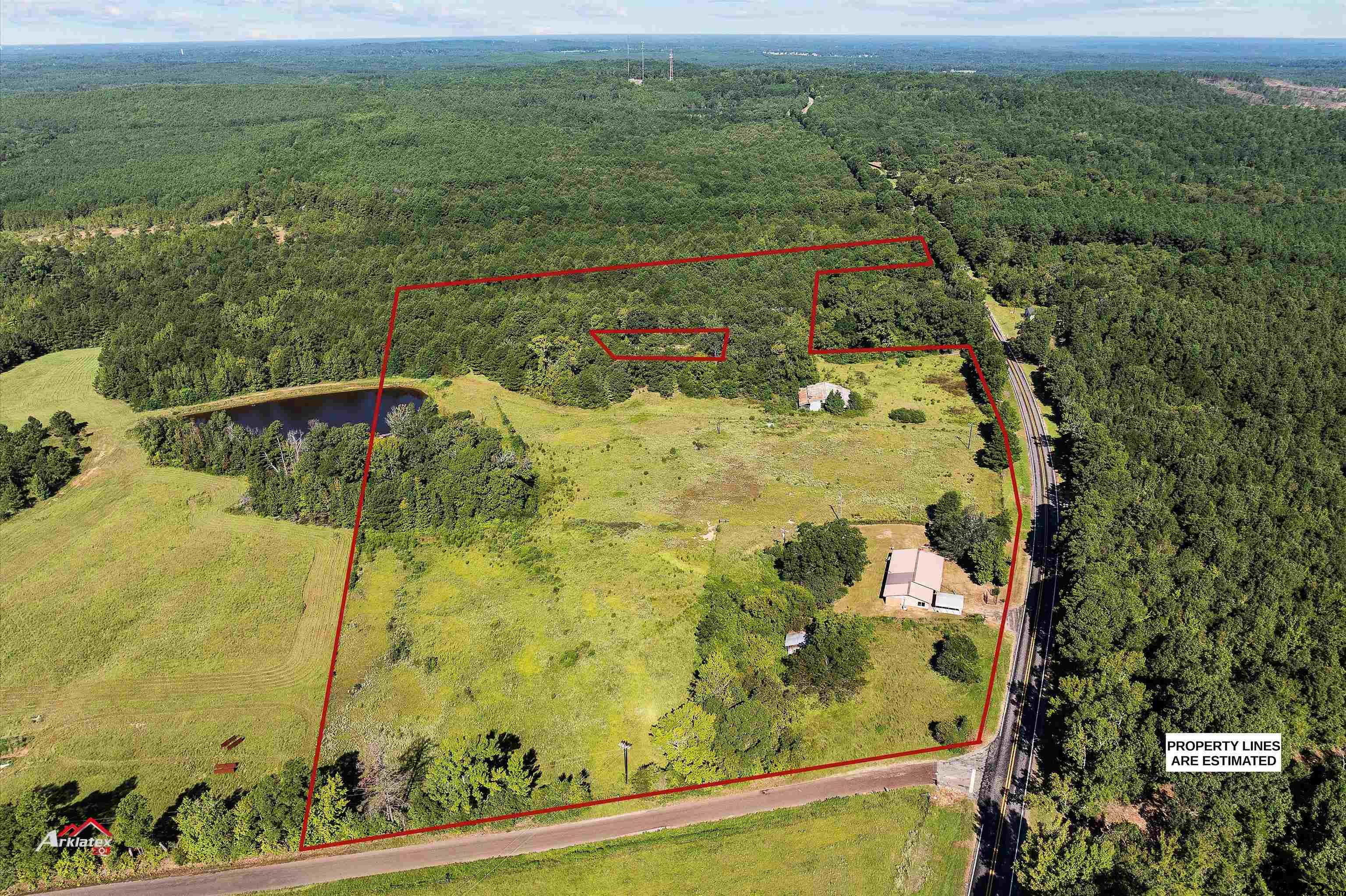 6973 FM 449 Marshall, TX 75670 - Photo 19 of 29 a view of a lake view