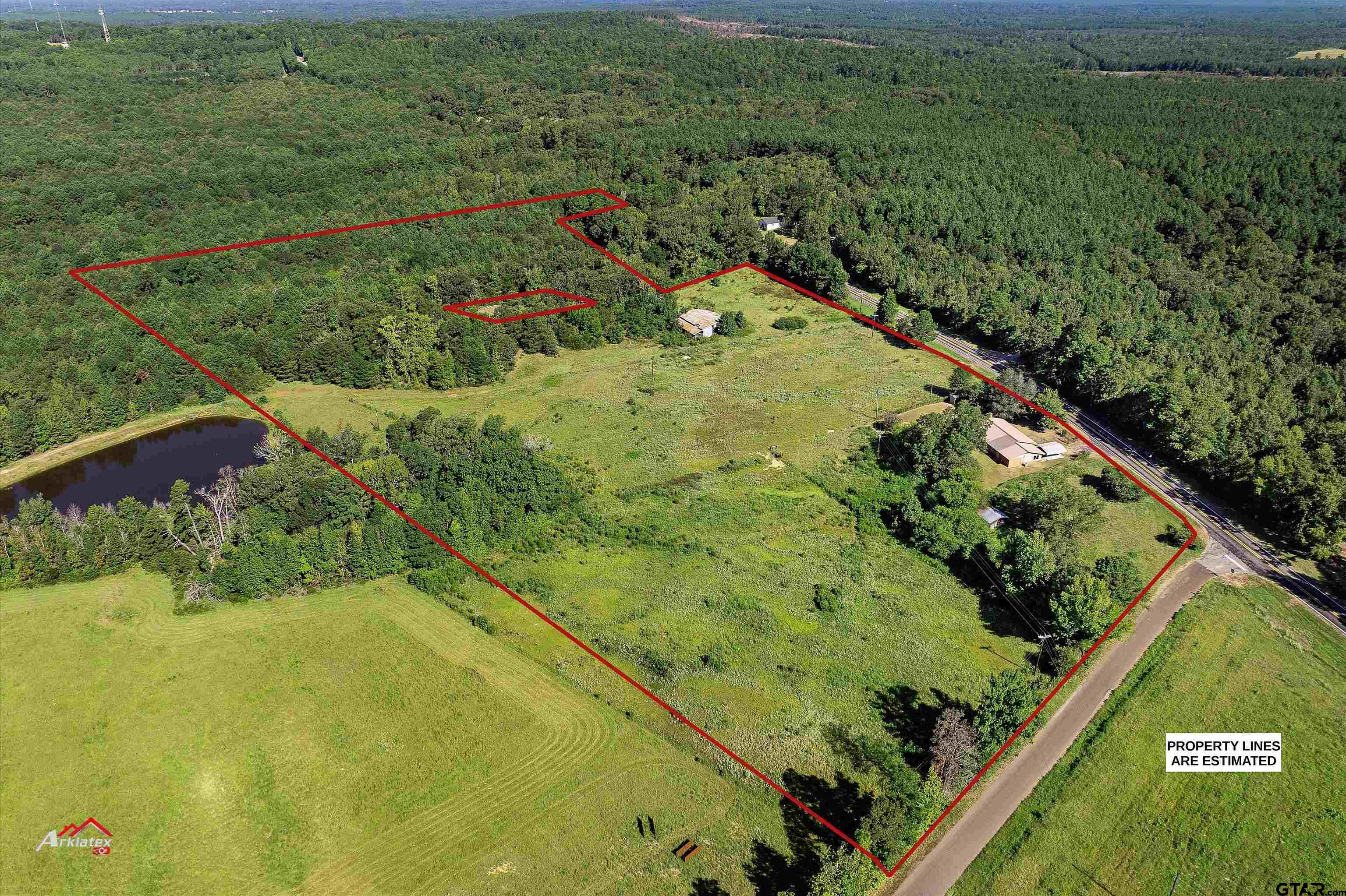 6973 FM 449 Marshall, TX 75670 - Photo 25 of 29 a view of a garden with an outdoor space