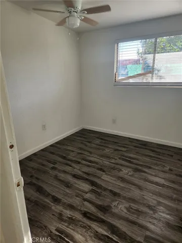 a view of a bathroom from a hallway