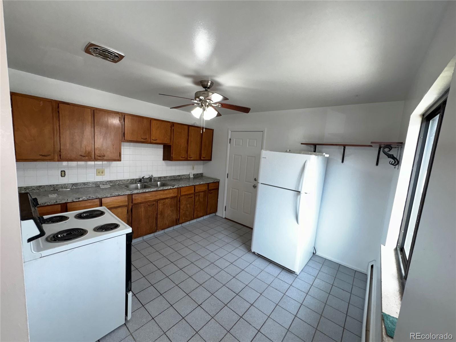 3289 Benton Street, Unit F Wheat Ridge, CO 80212 - Photo 4 of 21