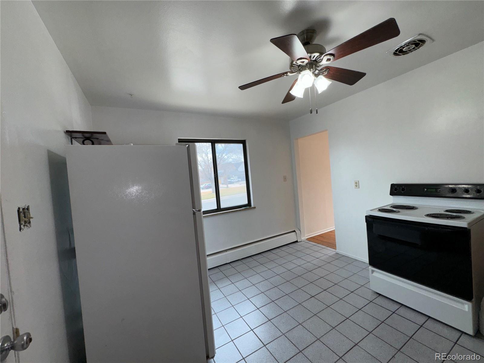 3289 Benton Street, Unit F Wheat Ridge, CO 80212 - Photo 5 of 21