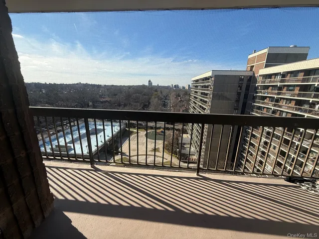 a view of balcony with wooden floor