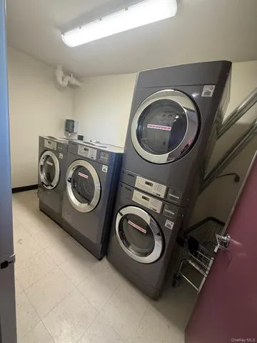 a view of a water heater and a bench