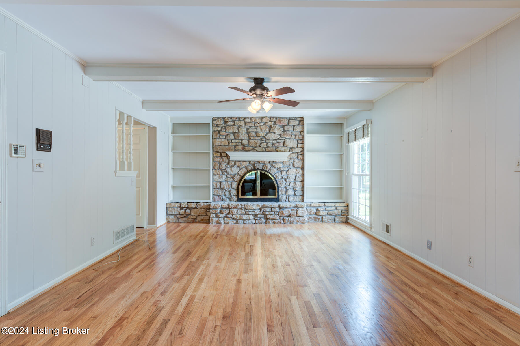 710 Farmingham Road Louisville, KY 40243 - Photo 10 of 48 Family room with pretty stone woodburning FP