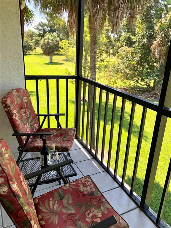 4338 27th Court Southwest, Unit 8201 Naples, FL 34116 - Photo 9 of 16 a view of a two chairs in the balcony