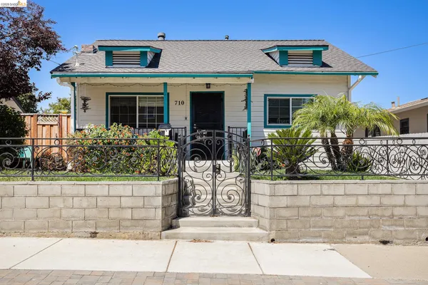 a front view of a house with garage