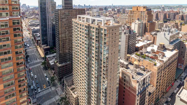 a view of a city with tall buildings