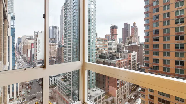 a view of a city with tall buildings