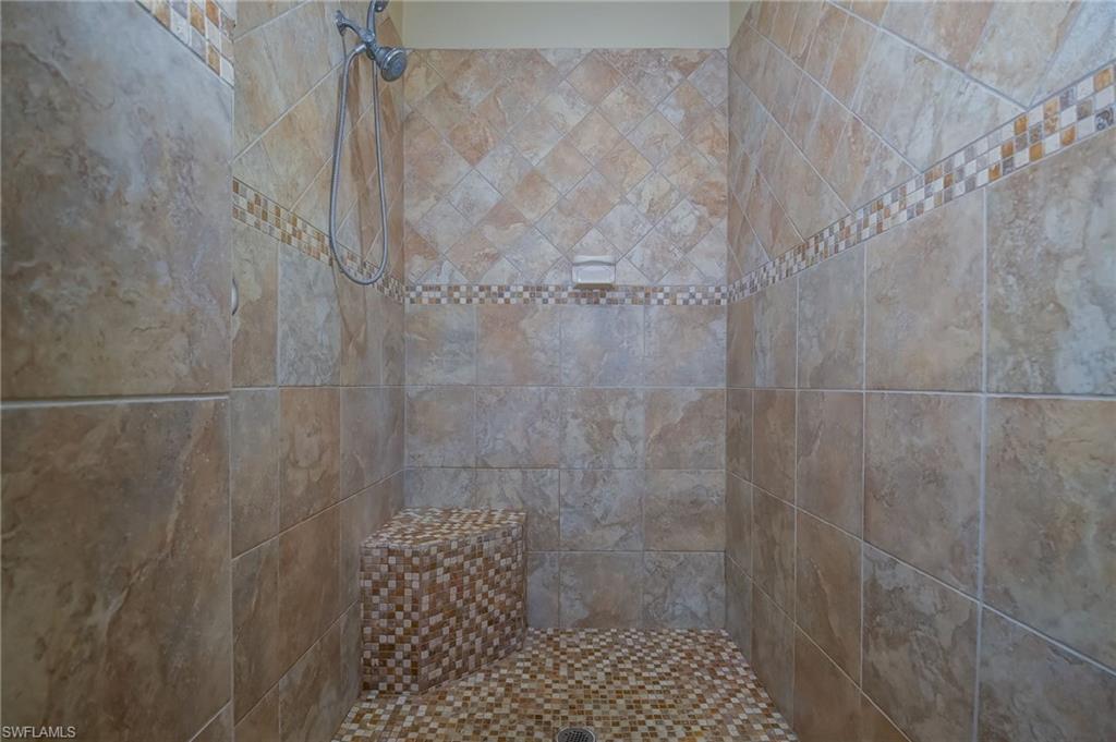 6350 Parkers Hammock Road Naples, FL 34112 - Photo 21 of 49 a bathroom with a shower