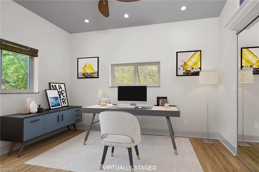 6350 Parkers Hammock Road Naples, FL 34112 - Photo 22 of 49 a workspace with furniture and window