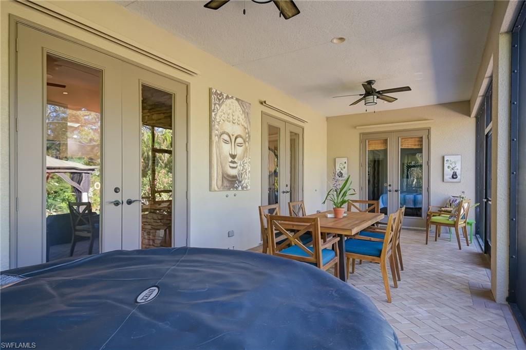 6350 Parkers Hammock Road Naples, FL 34112 - Photo 27 of 49 a view of a livingroom with furniture and window