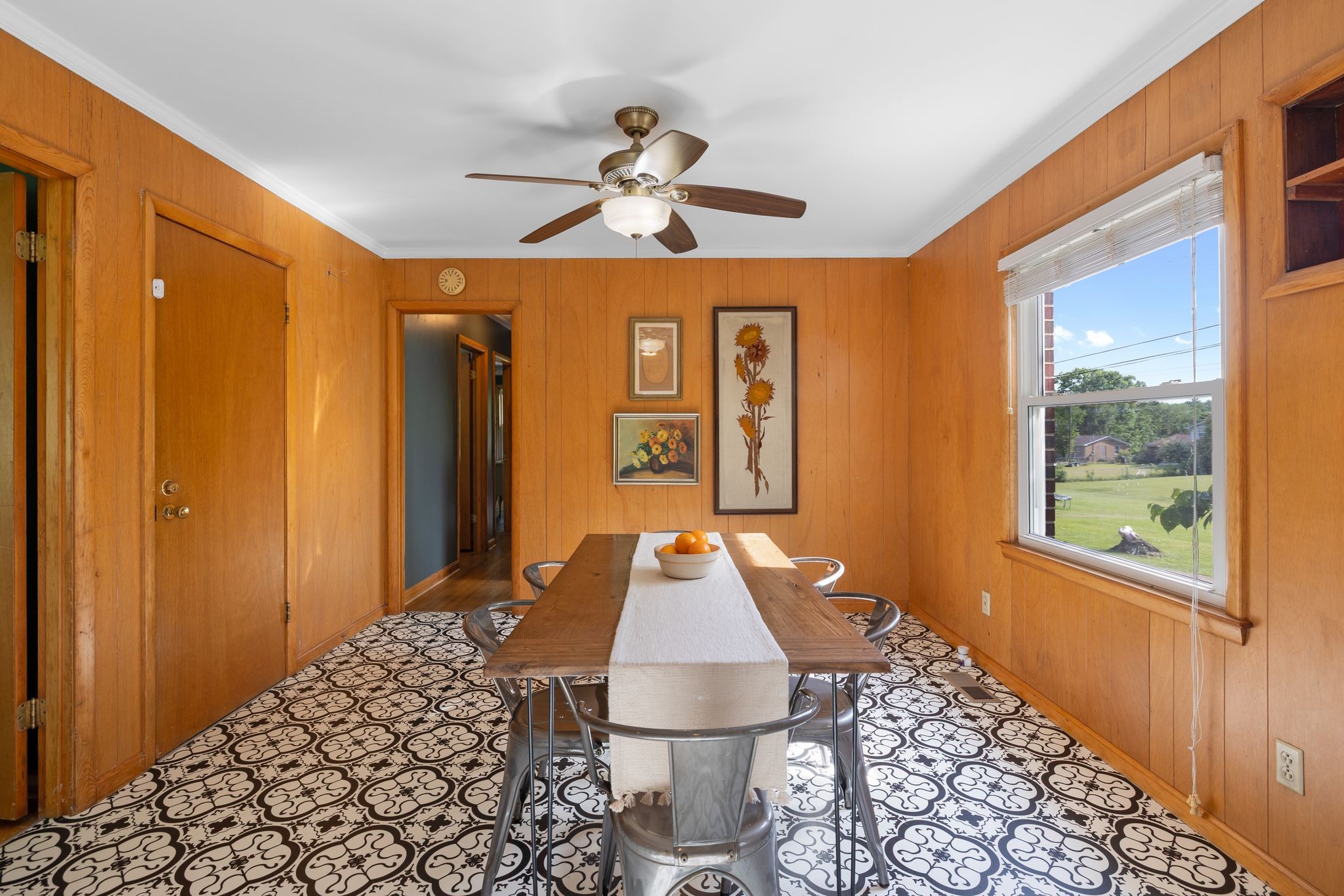 209 Apache Trail Columbia, TN 38401 - Photo 11 of 28 a workspace with wooden floor and a chandelier