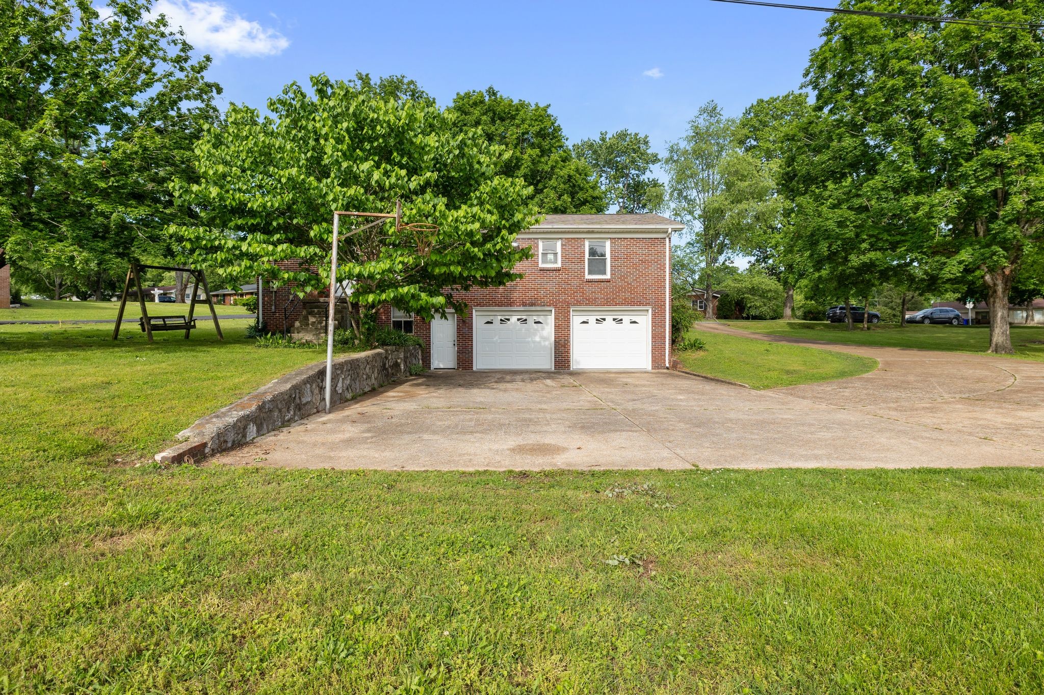 209 Apache Trail Columbia, TN 38401 - Photo 28 of 28 a backyard of a house with lots of green space