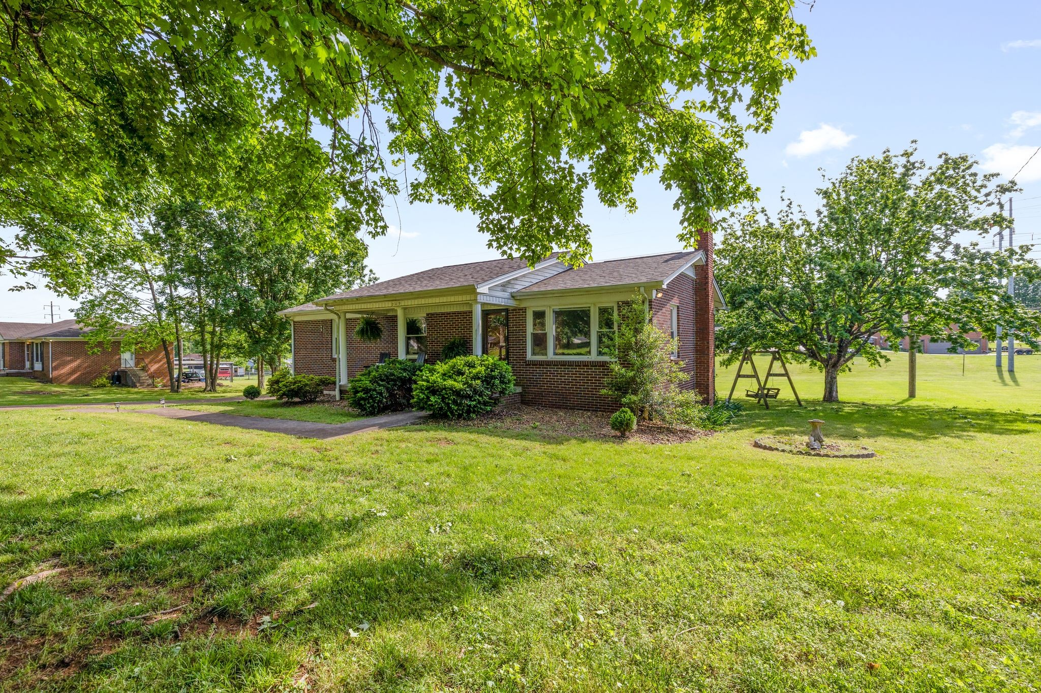 209 Apache Trail Columbia, TN 38401 - Photo 3 of 28 a front view of a house with a yard