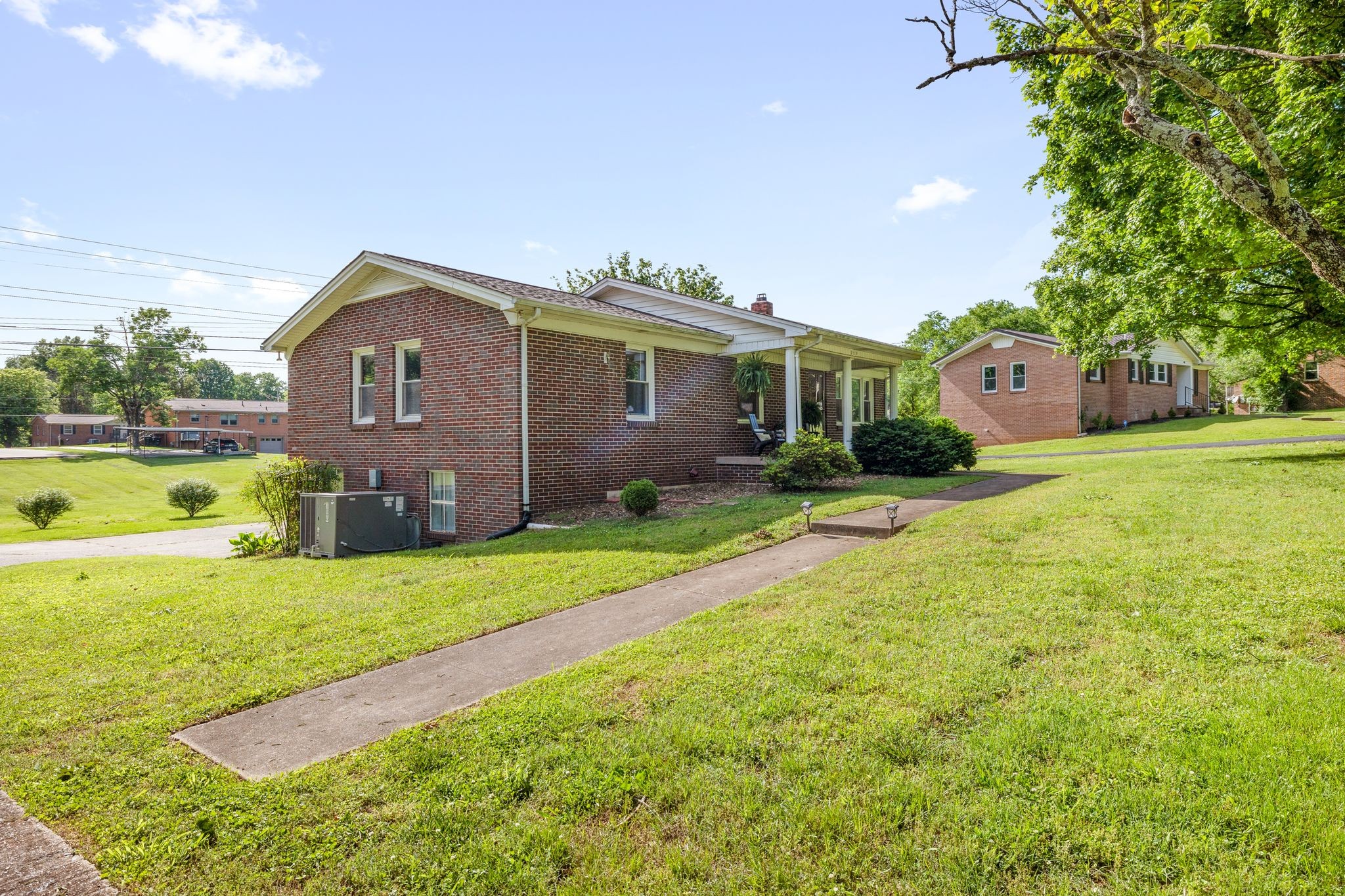 209 Apache Trail Columbia, TN 38401 - Photo 4 of 28 a front view of house with yard and green space