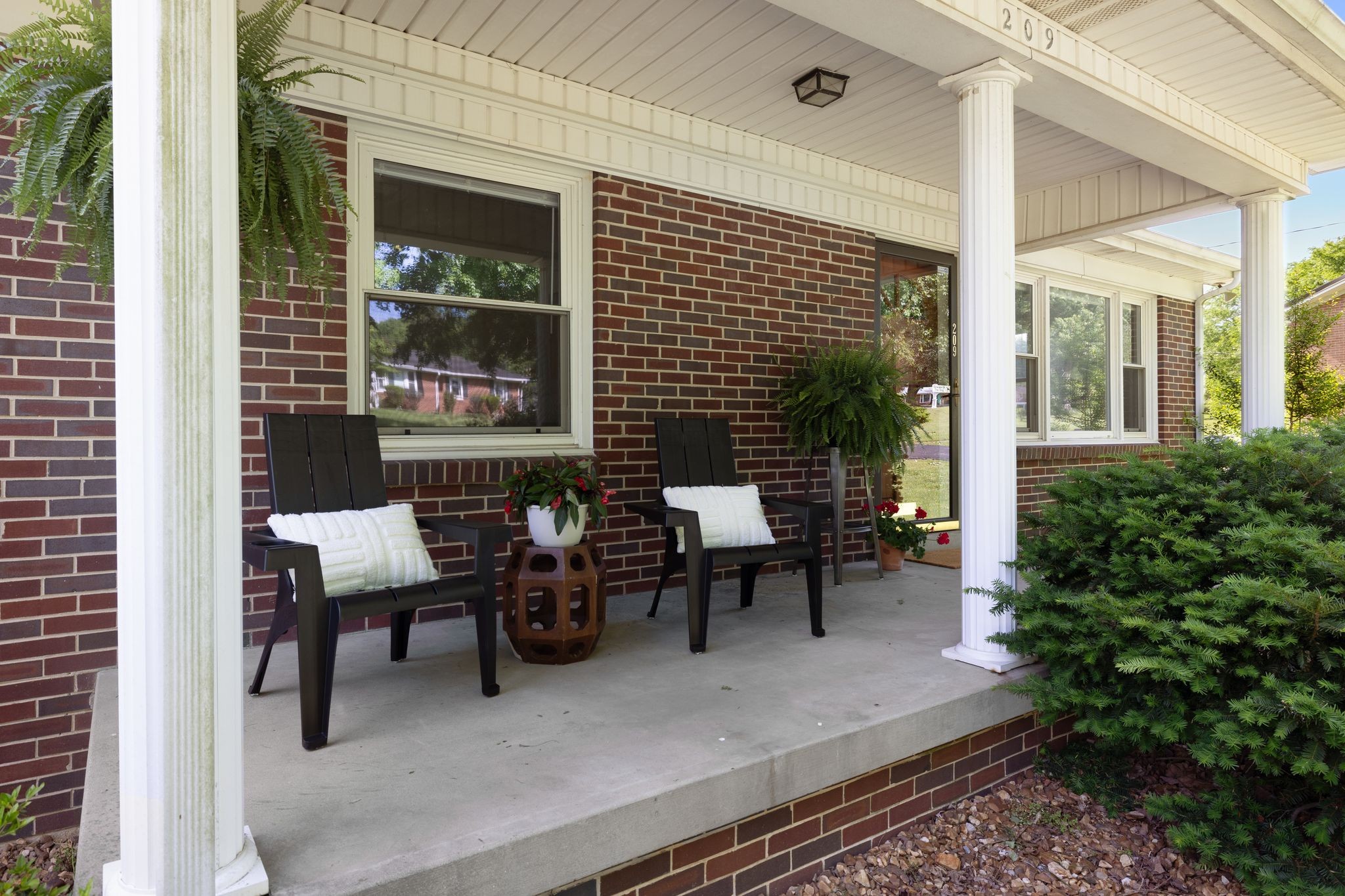 209 Apache Trail Columbia, TN 38401 - Photo 5 of 28 a view of a two chairs in the balcony